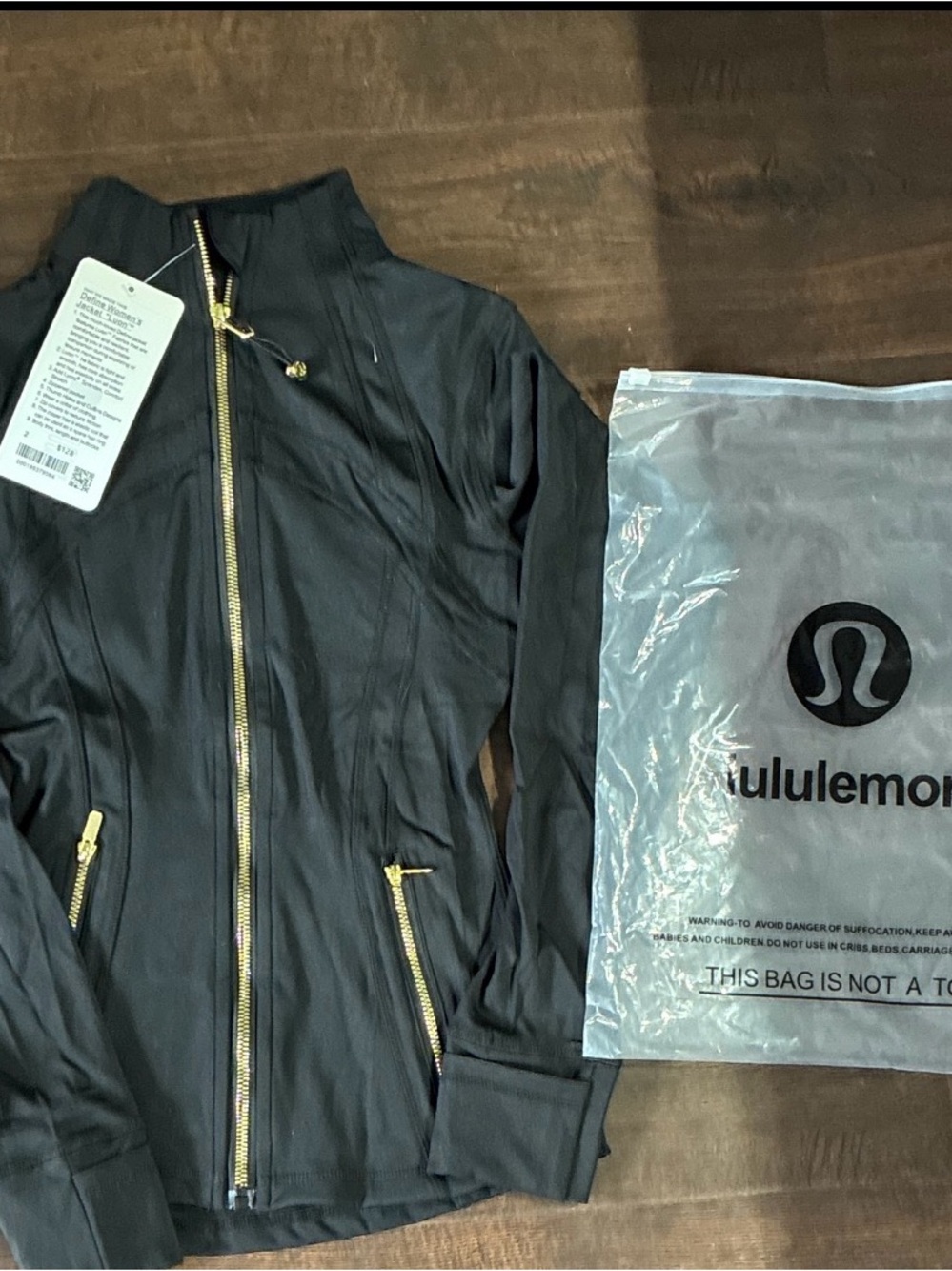 lululemon athletica Black Zip-Front Jacket with Gold Hardware